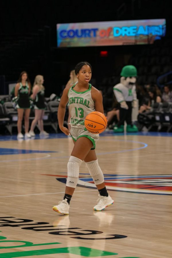 Girls basketball faced Bishop Kelley Jan. 15, at the Paycom Center in downtown Oklahoma City. The Irish debuted their “Central Catholic” jerseys paying homage to the original name of the school in the 26-46 loss to the Comets. “I enjoyed playing in the Paycom Center,” senior captain Rae Crisp said. “It was a once in a lifetime experience.” 

