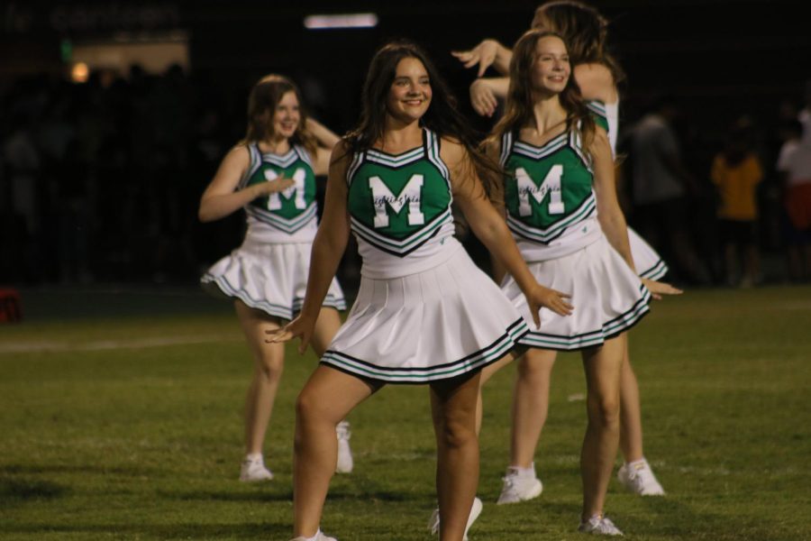 Laura Wright and Izzy Graves perform at halftime during the Sept. 2 game against Clinton. 