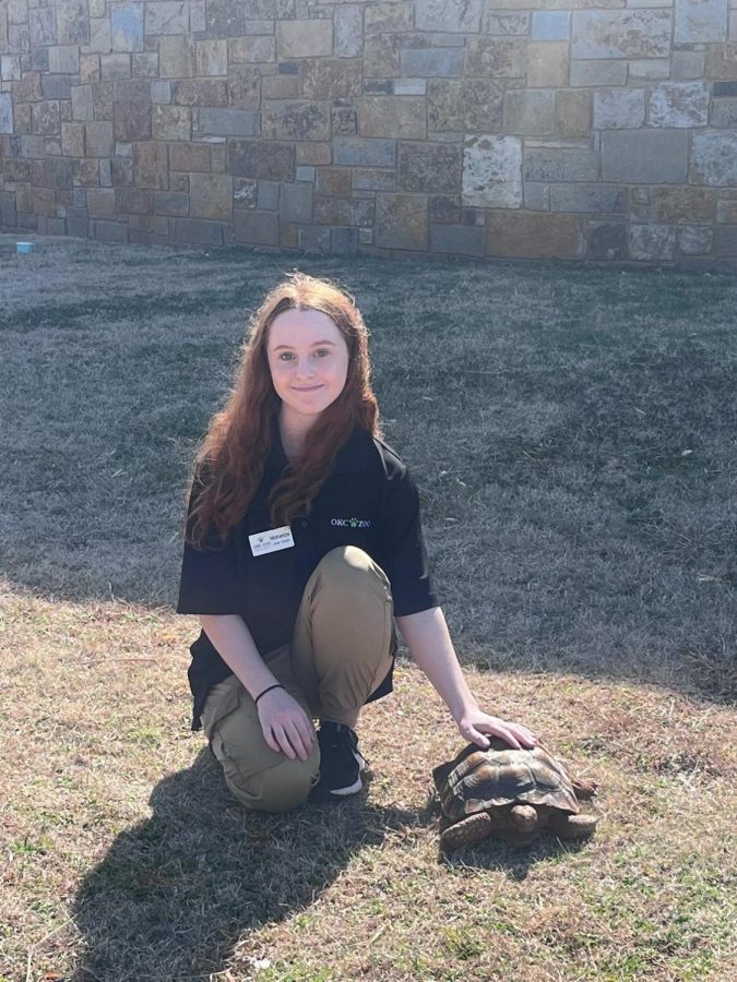 McKenzie Morgan at the zoo for her junior curatorship.