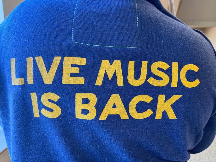 Banton Ward (12) wears a sweatshirt with the words Live Music is Back. Photo by Julia Coats 