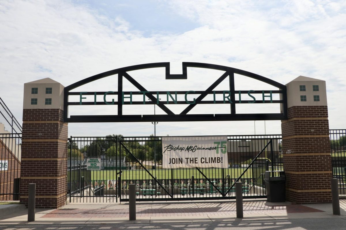 Outside the front gates of the football stadium. Signs will be posted displaying new safety procedures.