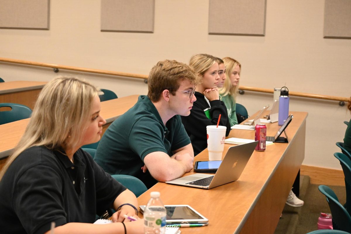 Students listen to Latham at the workshop. 