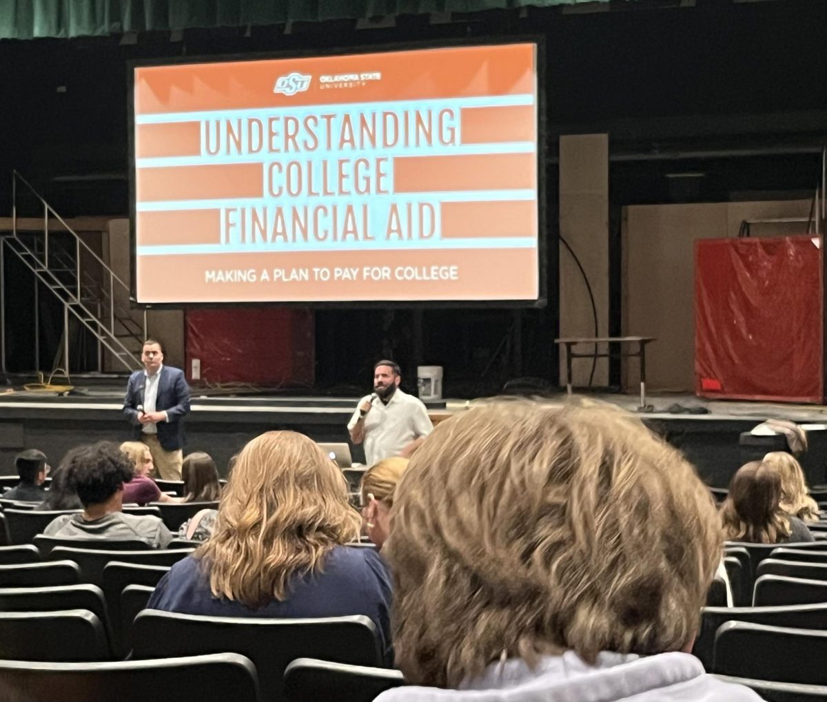 Senior counselor Dillon Walker introduces guest speaker James Powell, Assistant Director of Undergraduate Admissions at Oklahoma State. university.
