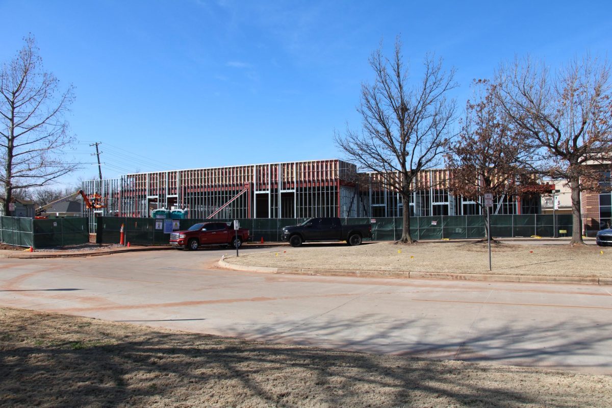 Construction crew continues work on framing