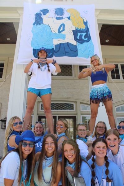 Elyse Cronic, a 2021 graduate, is shown in the back left corner. Cronic rushed Alpha Delta Pi at Oklahoma State University. 