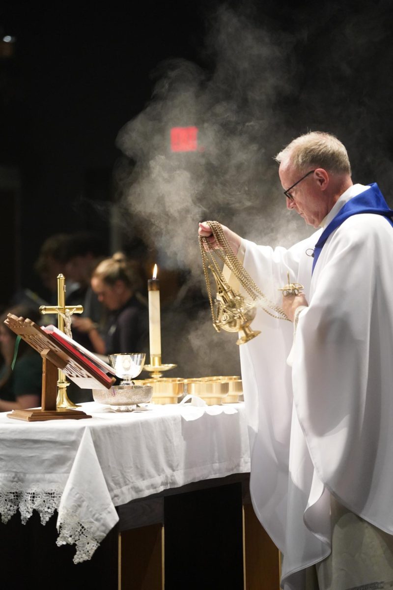 Fr. Rick Stansberry celebrates mass with the student body on the Feast of the Assumption of Mary, Aug. 15.