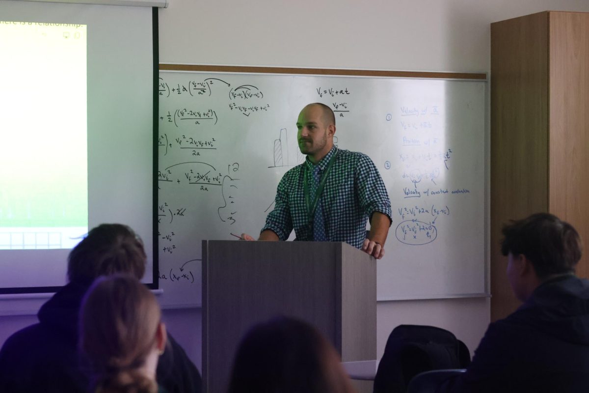 Science teacher Chris Ruesewald instructs the Methods of Science class. 