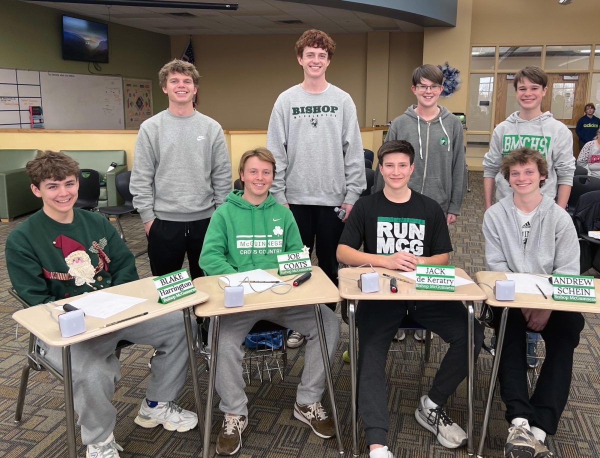 Academic team sits for photo after Area Tournament. Pictured (sitting then standing):
Blake Harrington, Joe Coats, Jack deKeratry, Andrew Shien,
Sterling Kovash, Burke Johnson, Daniel Tunell, Wesley Lemons. Photo courtesy of Nicky Goff