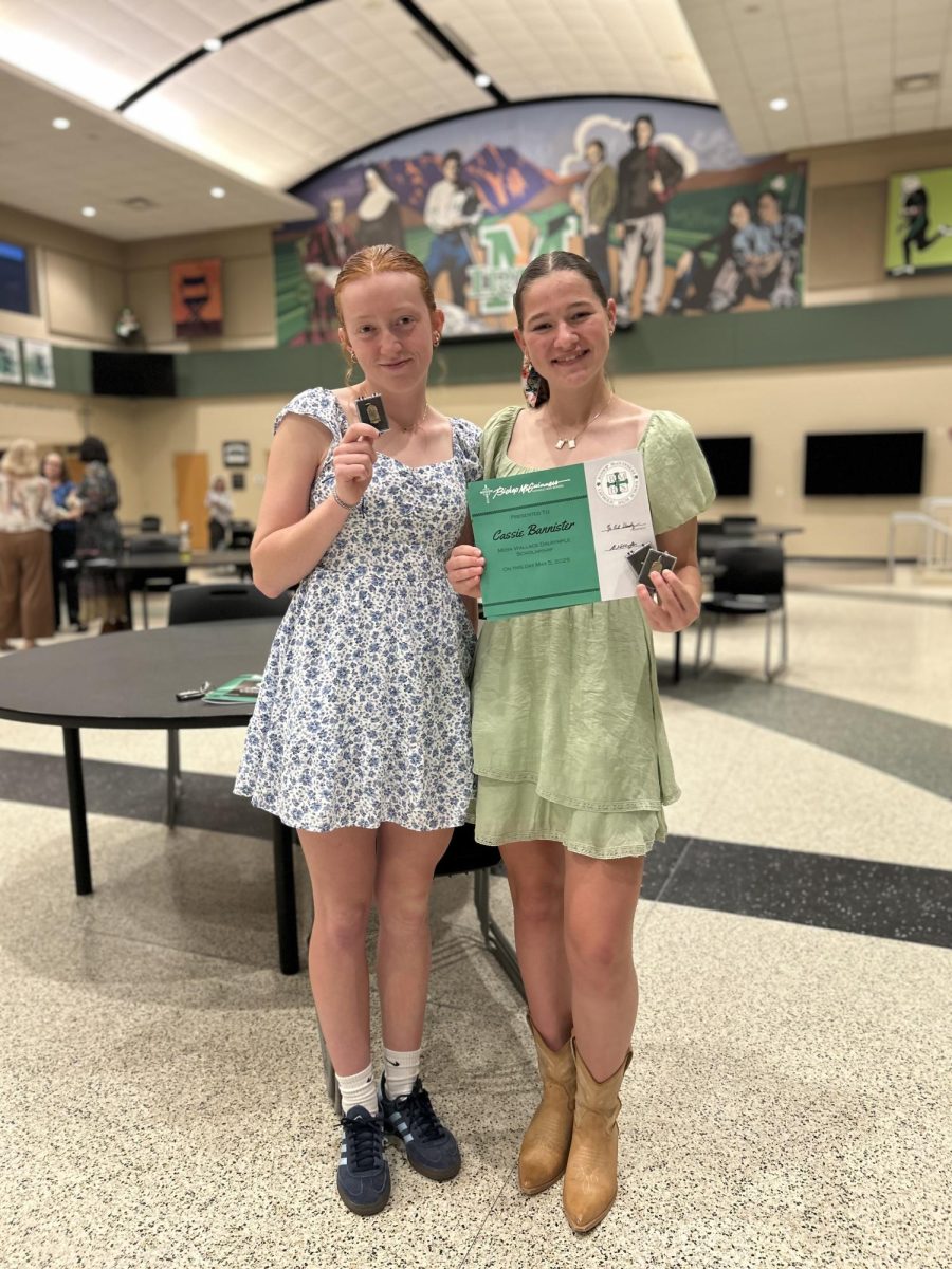 Sophomores Finley Cataldi and Cassie Banister stand for photo after being awarded for their leadership accomplishments.