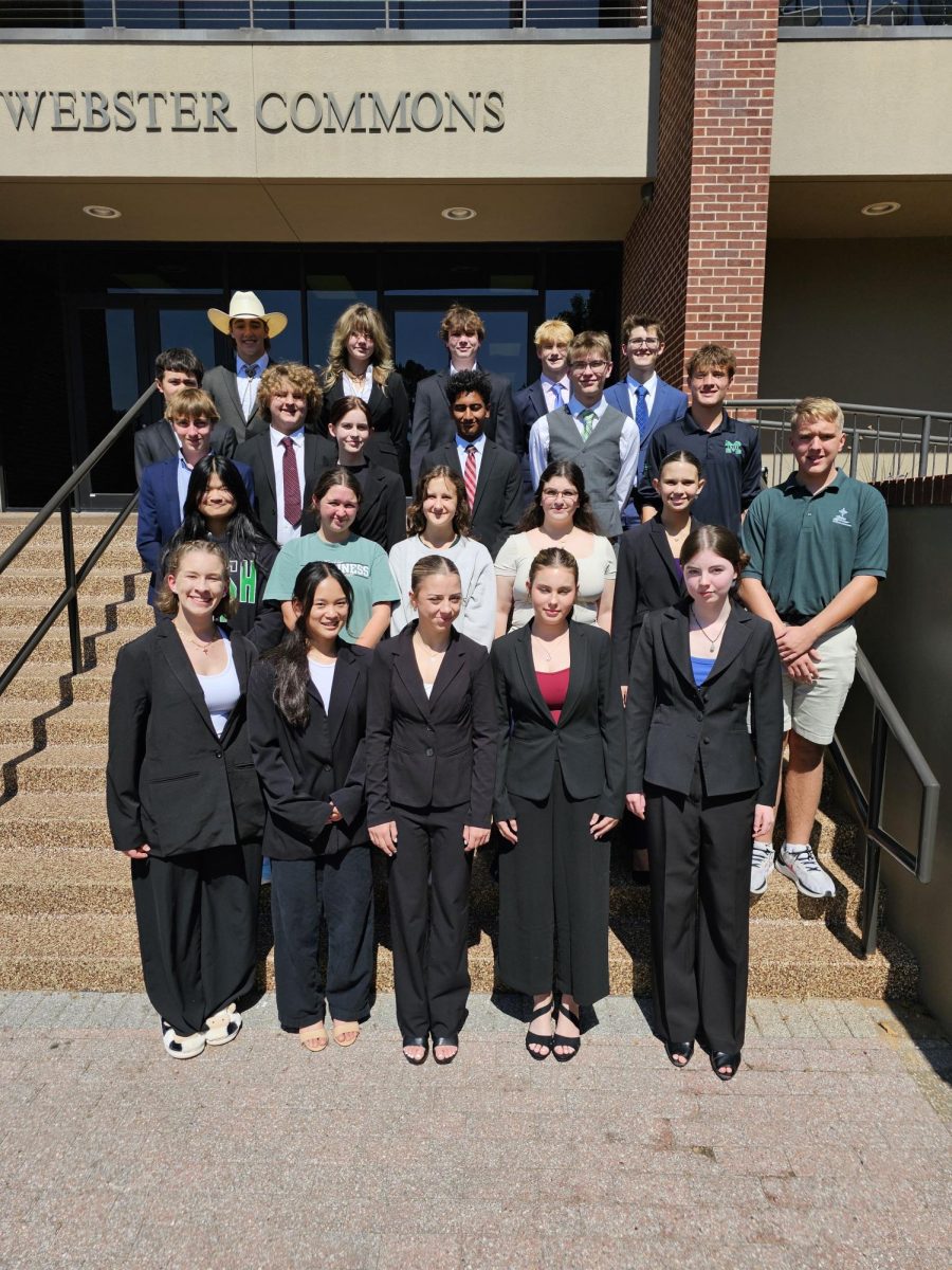 Debate team poses for a photo prior to their Sept. 26 tournament.