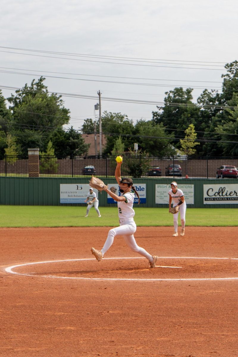 Junior Olivia Giles winds up for a pitch.