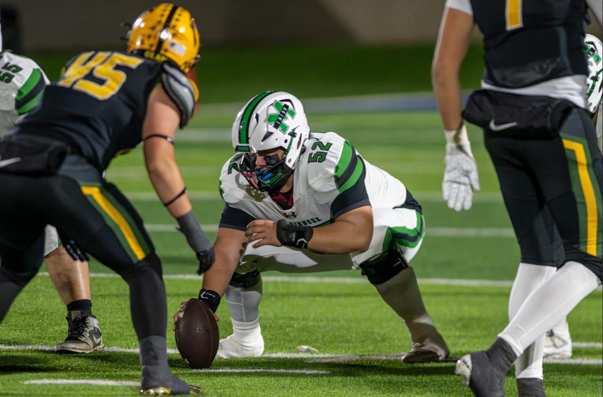 Ready set go! Senior Center Gavin Brazil gets ready to snap back the ball to the quarterback in a Nov. 7 game against Lawton MacArthur. Photo courtesy of Gavin Brazil
