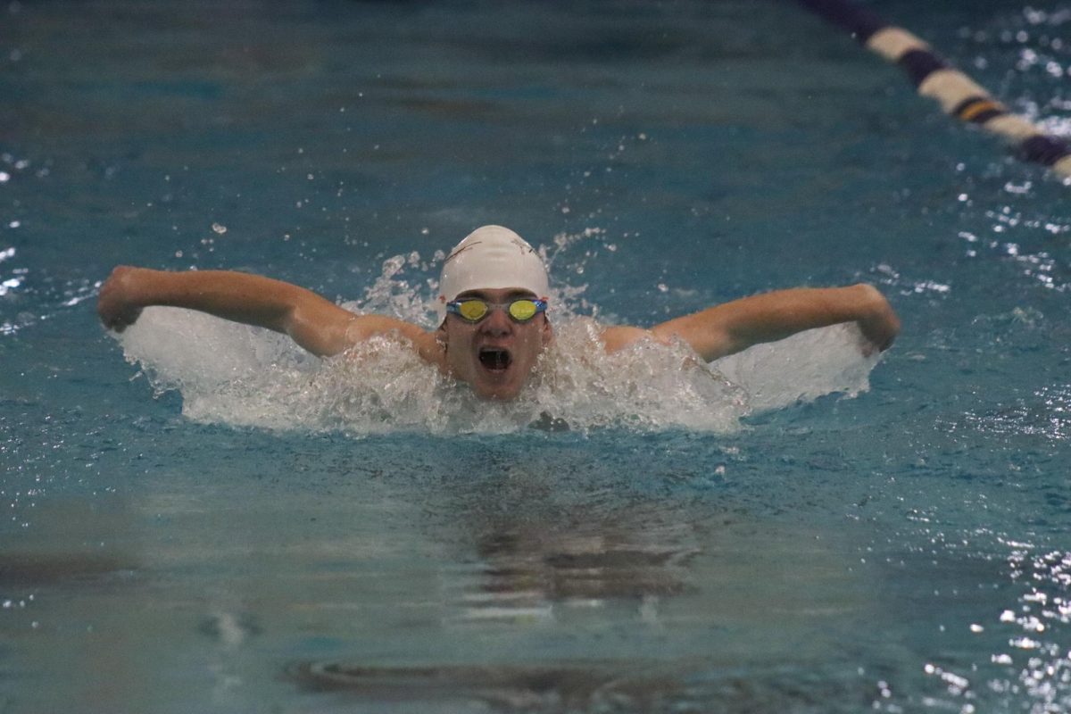 Senior James Schultz competes in Jan. 15 Mitch Park meet. 
