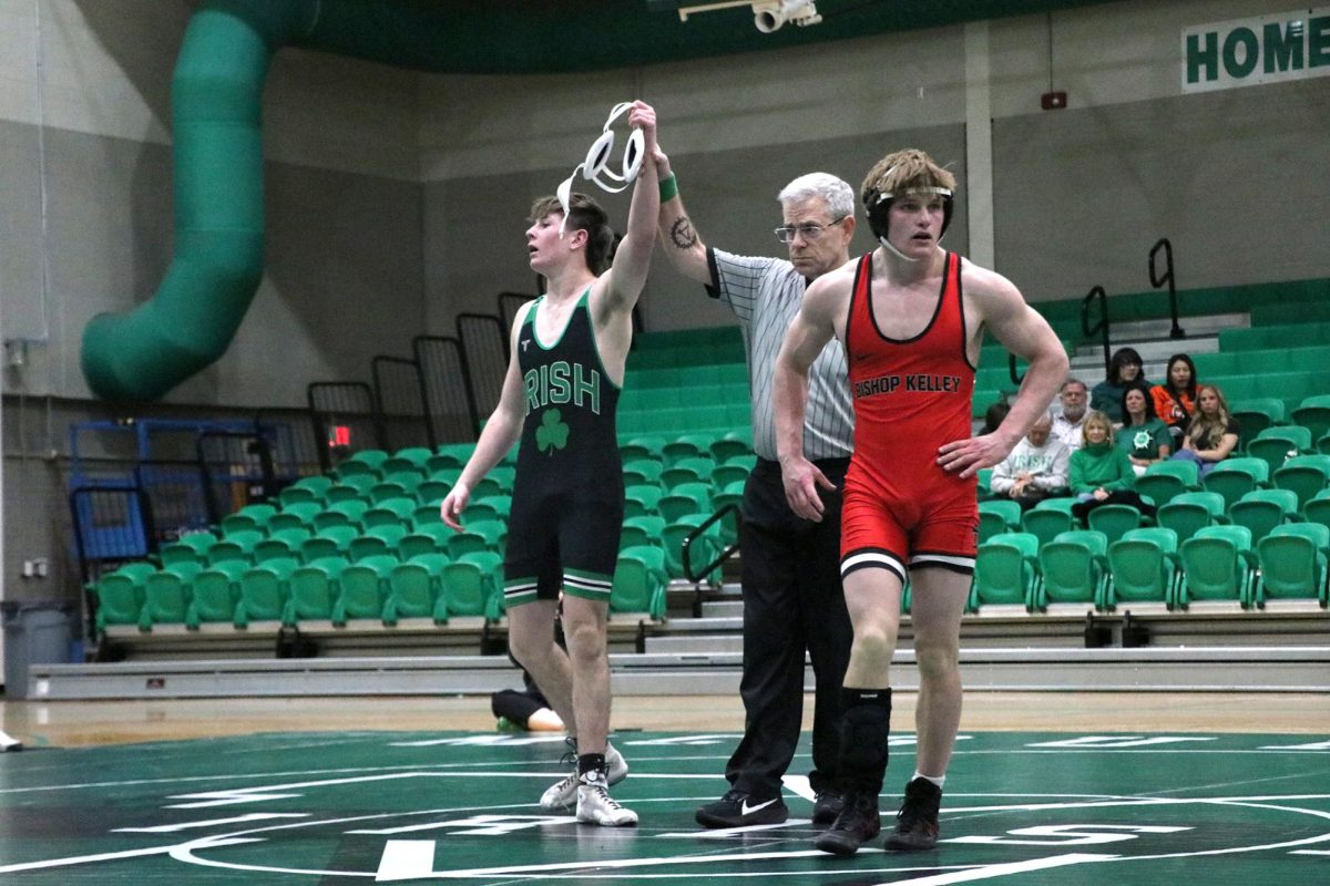 Junior Luke Parcell claims victory at Bishop Kelley Heritage Hall Tri Dual.