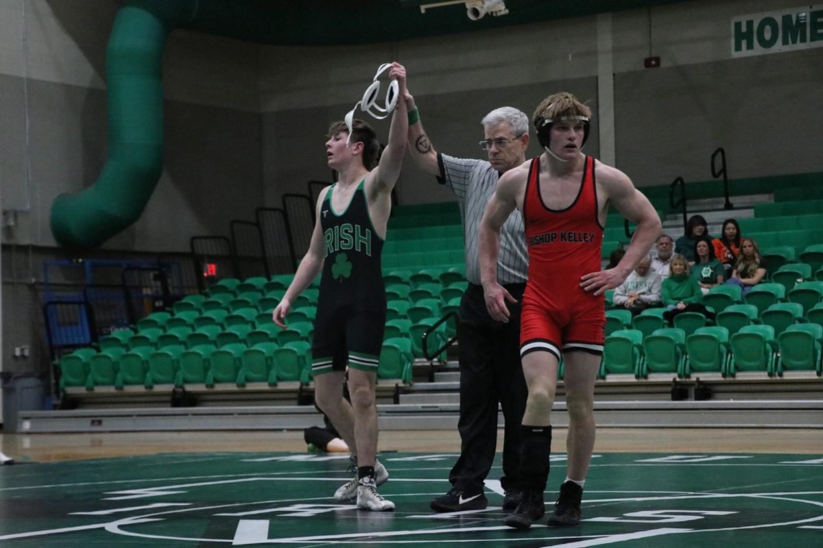 Junior Luke Parcell claims victory at the Bishop Kelley Heritage Hall Tri Dual Tournament. 