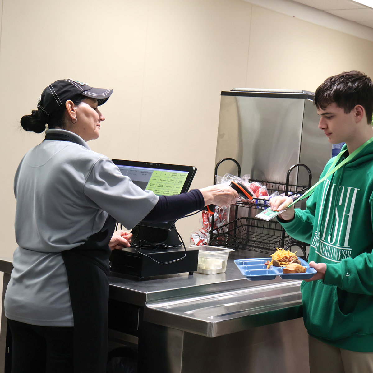 Freshman Colin Merkel buys food in the cafeteria.