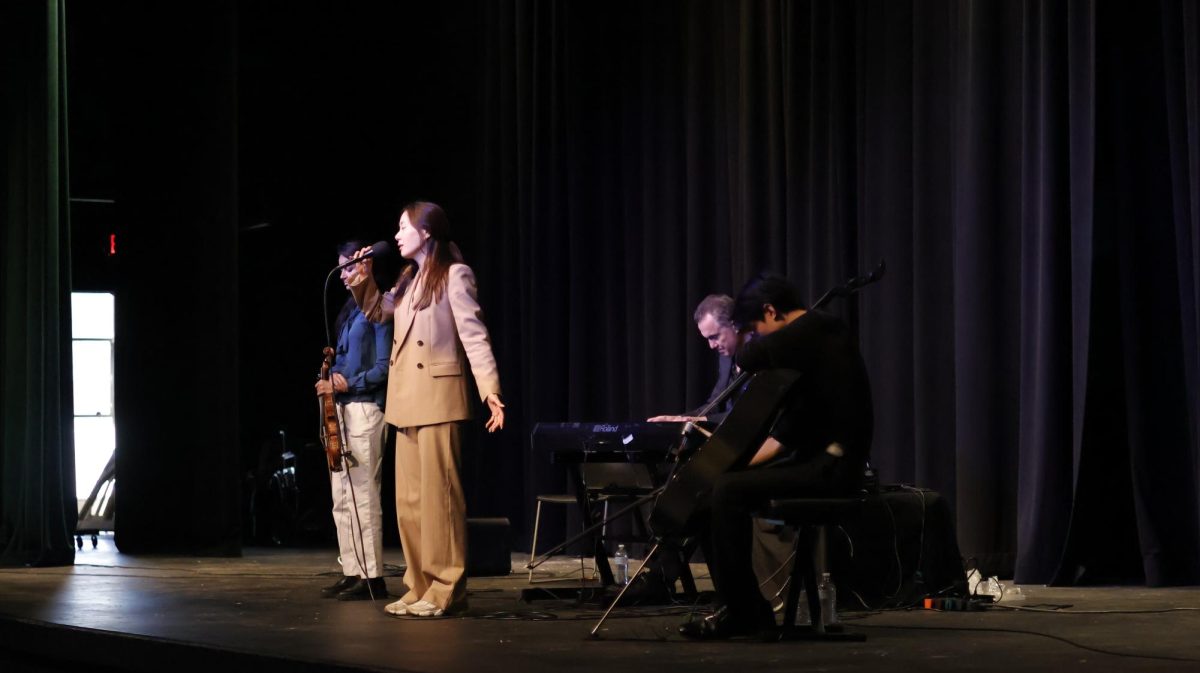 Pianist Eric Genuis performs with string duet and vocalist. 

Photos by Molly Taylor 