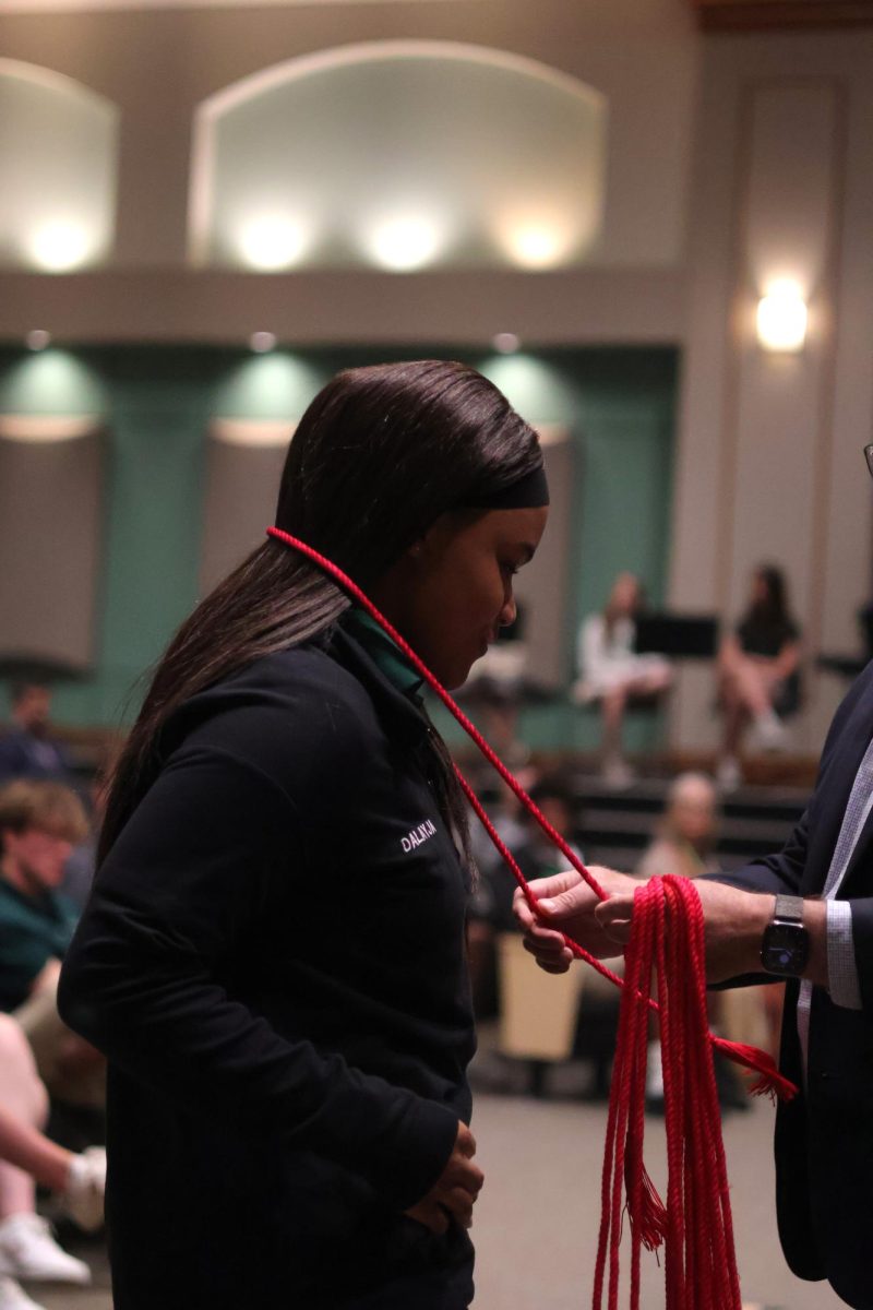 Receiving her red cord is senior Dalayja Armstrong.